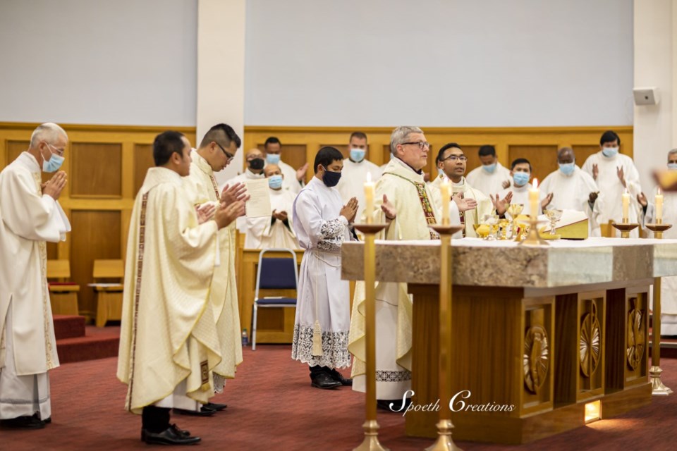 On Oct. 1, three new Catholic priests were ordained in St. Paul at the cathedral. Prithi Spoeth photo.