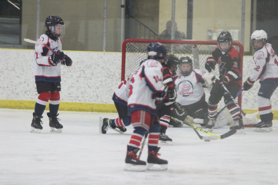 Lac La Biche U-11 goalie Greyson Menard gets a good look at the puck through traffic in front of his net during Saturday's final regular season game against Lloydminster.      Image- Rob McKinley