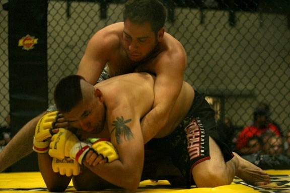 Samarai Khardassian (top) takes on Elmer Waterhen at King of the Cage in Cold Lake on Sept. 18.