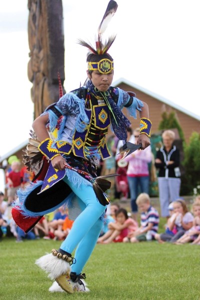 Dancer Kenneth Gadwa, from Kehewin Cree Nation, dances in front of a crowd of more than 200 celebrating National Aboriginal Day June 21.