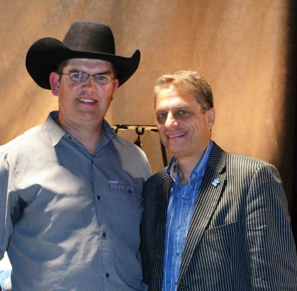 Gary Mostert (left) stands with Frank Viti, president and CEO of Autism Speaks Canada at the fundraiser on Oct. 5.