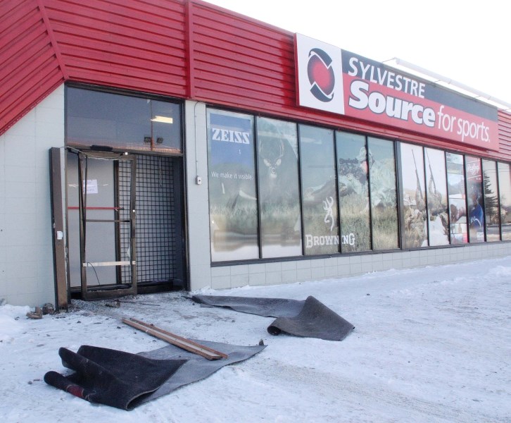 The entrance of Sylvestre&#8217;s Source for Sports following a robbery at the store early Sunday morning that saw suspects make away with 10 to 15 long barreled rifles.