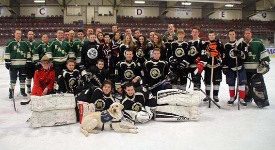 The Bonnyville RCMP and team of local high school players played to an 8-8 tie at the C2 on Feb. 9.