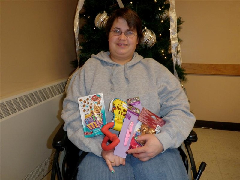 Kate Polzin, a DAC client who went shopping to support the animal shelter and a local family in need.