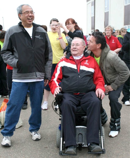 Elk Point Mayor Parrish Tung has a laugh at the antics of Cold Lake Mayor Craig Copeland, while Bonnyville Mayor Ernie Isley gets ready for the Lakeland MS Walk on Saturday.