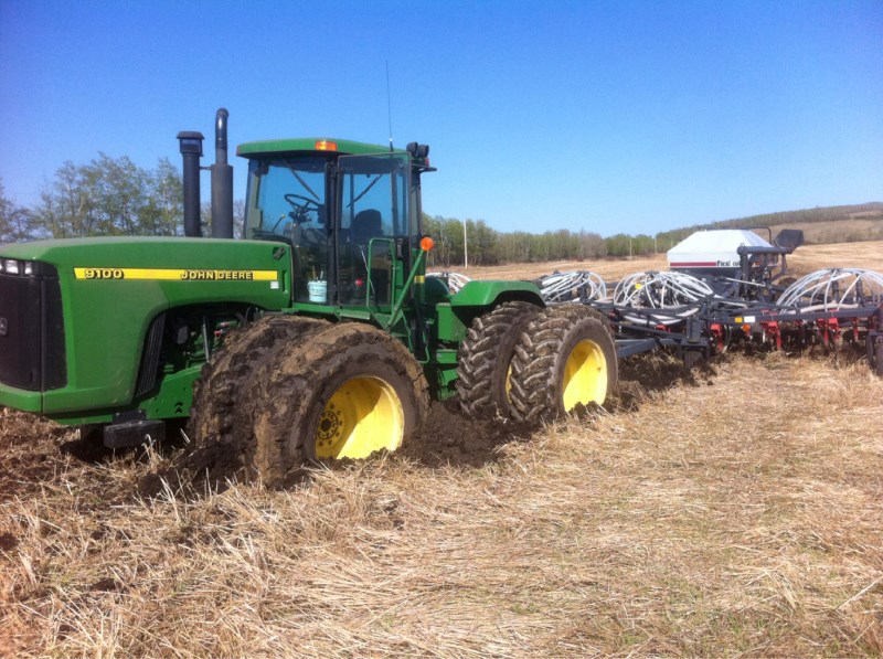 There&#8217;s more than a few wet spots in area fields this year. Flat Lake farmer Archie Richard kindly shared this picture of one of his more challenging days out on the