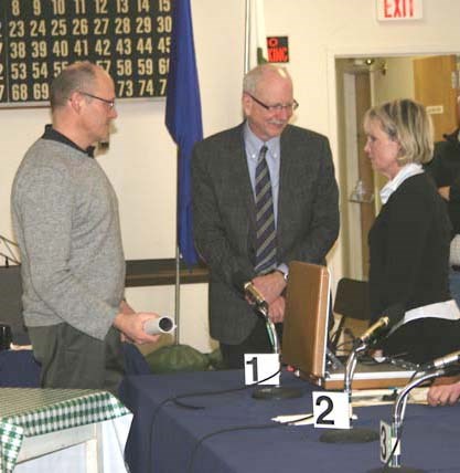 MLCS interveners Mark Beaulieu and Coralee Beaulieu talk to ERCB panelist Rob McManus after the hearing concludes.