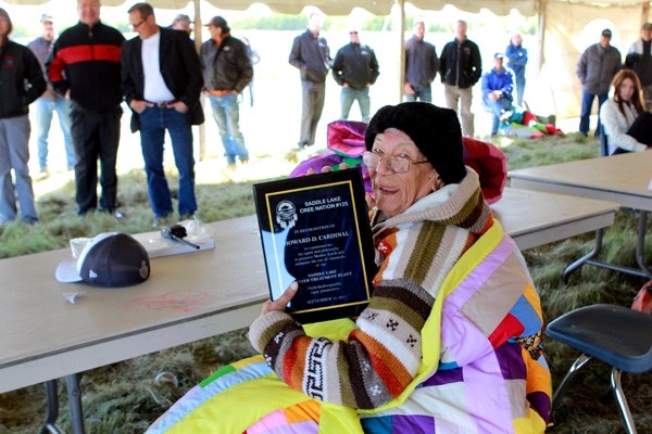 Jean Cardinal accepts a plaque of recognition for all the hard work put into the new water treatment plant by her late husband, Howard Cardinal.