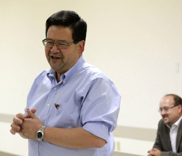 PC leadership candidate Gary Mar speaks while MP Brian Storseth listens at a meeting in Mallaig on Monday.