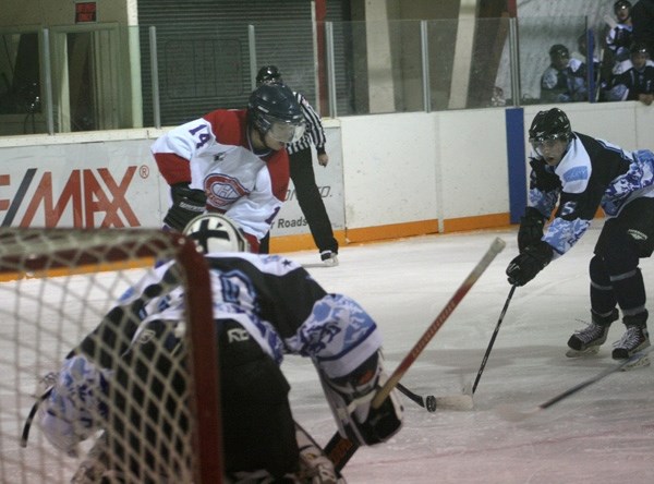 Justin Funk takes a shot against the Ice in Cold Lake on Friday night.