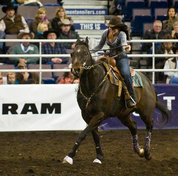 Rylee McKenzie competes at CFR in Edmonton. The local barrel racer will travel to Texas in the new year to continue competing.