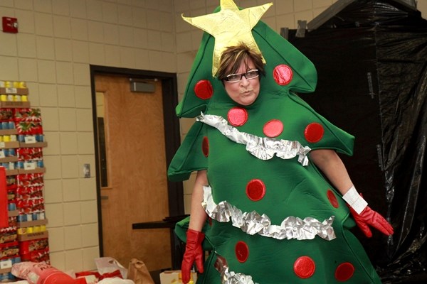 Glen Avon School principal Debbie Thorne dances to Party Rock Anthem as a reward for students who brought in 6,346 pounds of food for the food bank on Wednesday.