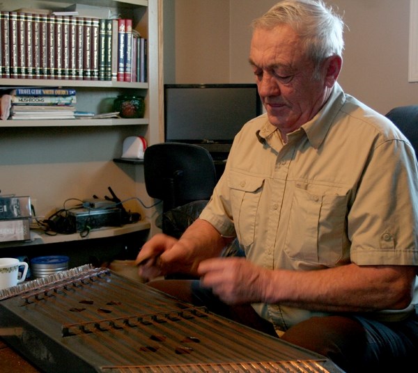 St. Paul&#8217;s Russell Paziuk performs a song on his hammered dulcimer, a traditional Ukrainian instrument he built from scratch. He is hoping to record some of his music