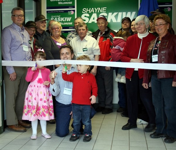 Jorja Nikiforuk and Lucas Nikiforuk, along with volunteers and supporters, helped Wildrose candidate Shayne Saskiw open a campaign office in St. Paul on Saturday afternoon.