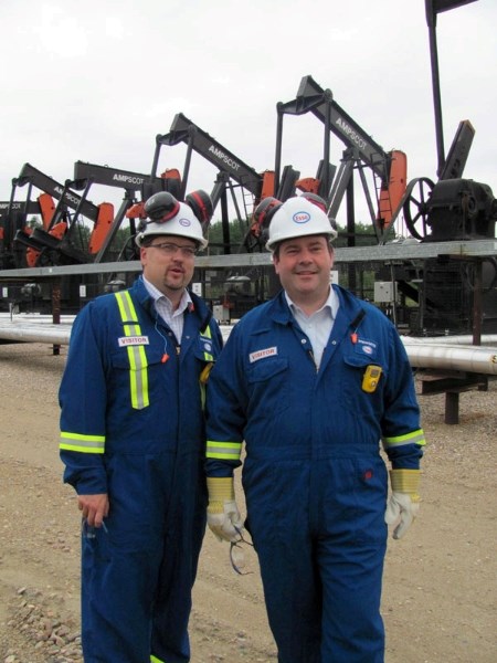 MP Brian Storseth (left) and Minister of Citizenship, Immigration and Multiculturalism Jason Kenney (right) visited the Imperial Oil facilities near Cold Lake after hosting a 