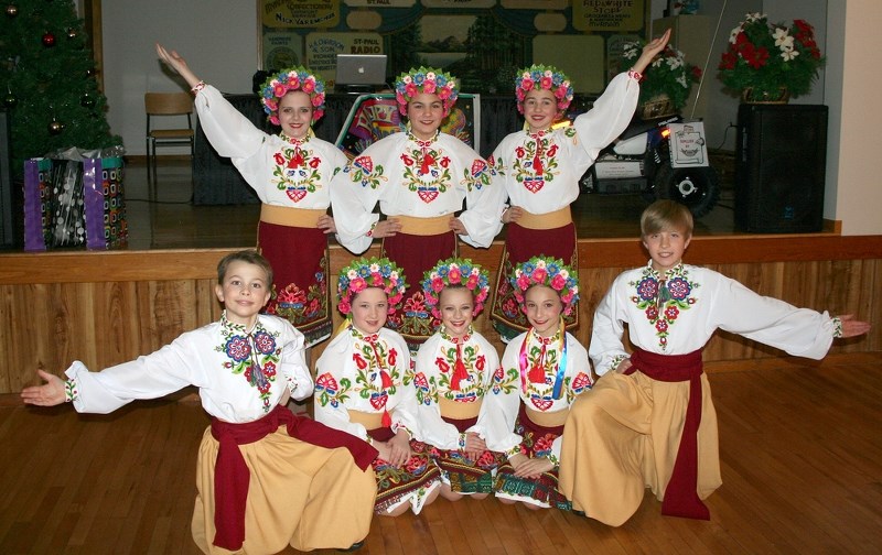 As part of the Malanka celebration, young Ukrainian dancers from the St. Paul area, including (back left) Emily Kotowich, Kelsey Kurek, Brooklyn Riopel, (front right) Clayton 