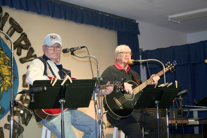 Reg Stacey (left) from Pierceland, and John Patterson from Cold Lake perform together at the Boscombe Country Corral on Jan. 25.