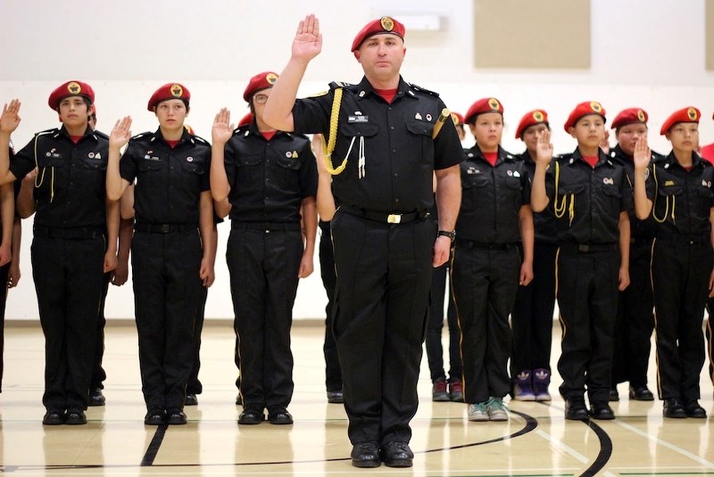 Captain Robert Hynes leads the Saddle Lake Community Cadet Corps through its pledge at last Wednesday&#8217;s year-end ceremony.