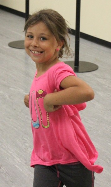 Dancer Amanda Lucksinger works on her Ukrainian dance skills at the Desna Dance Camp.