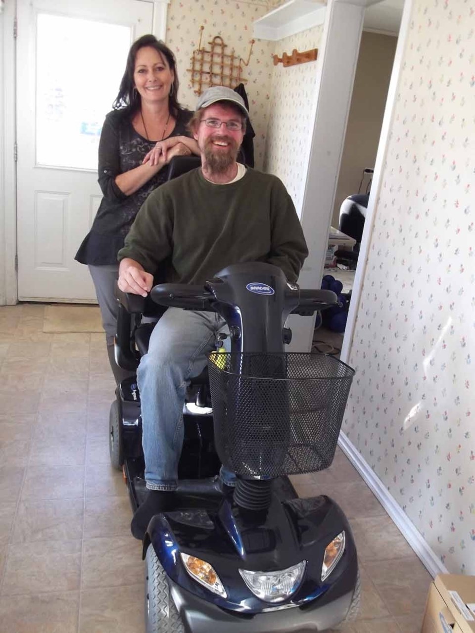 With the help of Gail Plouffe and other members of Lakeland&#8217;s MS Society, Andrew Philip has a place to live and a way to get around, with a new motorized scooter.