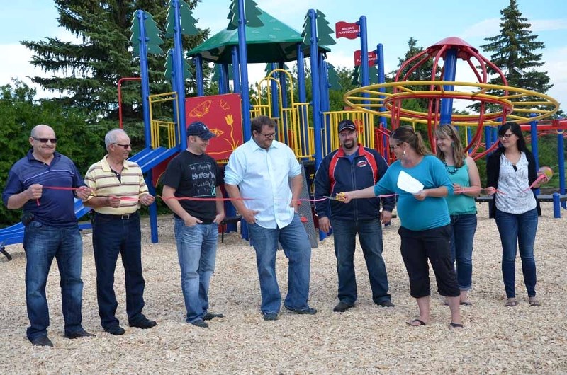 Amanda Amyotte had the honour of cutting the ribbon to officially open the Community playground.