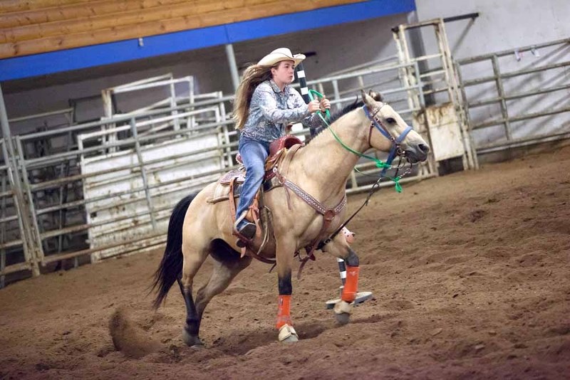 Participants in Sunday&#8217;s gymkhana event ride through the dirt in various events at the St. Paul Ag Corral, including pole bending, the key race, the stakes race, and