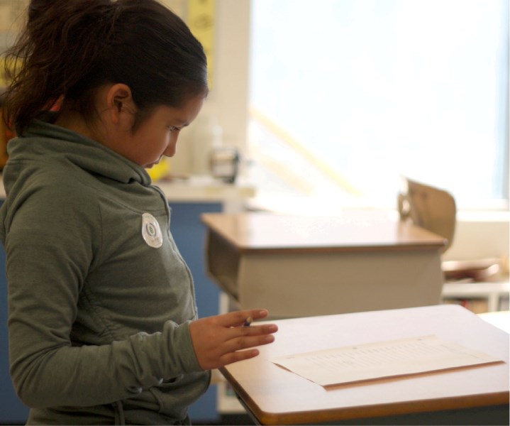 Lyric Lewis, 9, in Cree class at Central Elementary School.