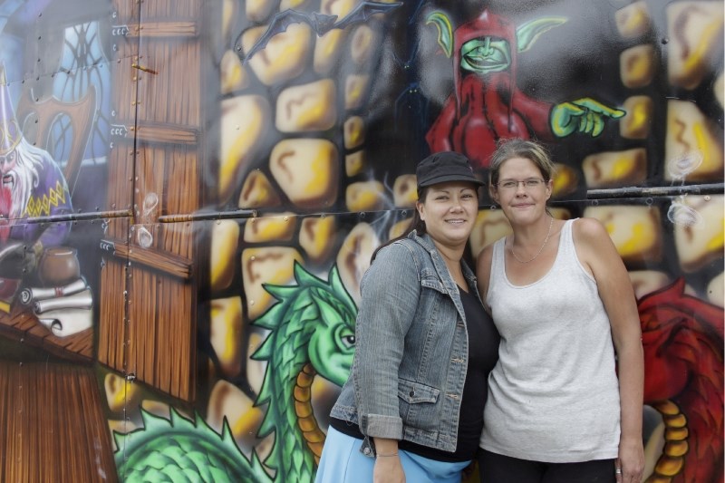 Good friends and great carnies, Shelley Russell (left) and Sam Potts at this year&#8217;s Pow Wow Days midway.