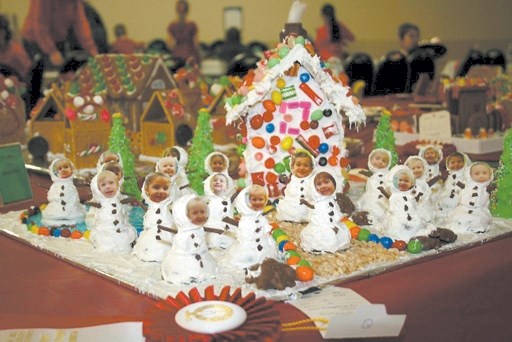 One of the award-winning gingerbread houses at Plamondon&#8217;s Festival Du No&euml;l shows the faces of its creators. It was made by the Hand in Hand Playschool from école