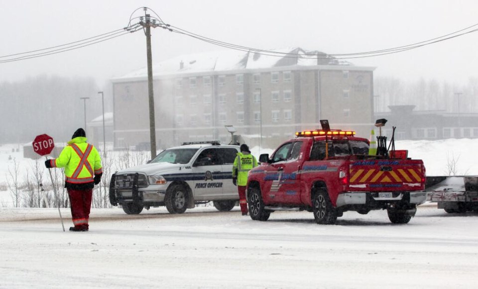 A heavy-rescue towing crew at the scene of a traffic accident at the edge of Lac La Biche in February.