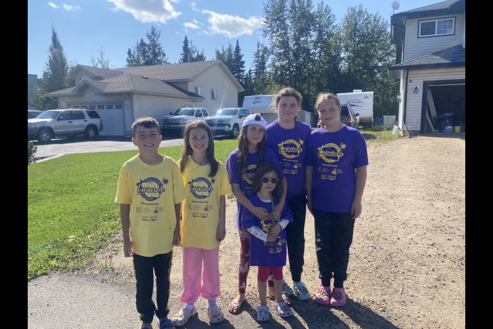 A group of local kids participated in this year's Lemonade Stand Day event in Lac La Biche, which is held annually to raise money for the Stollery Children's Hospital in Edmonton. Photo supplied. 