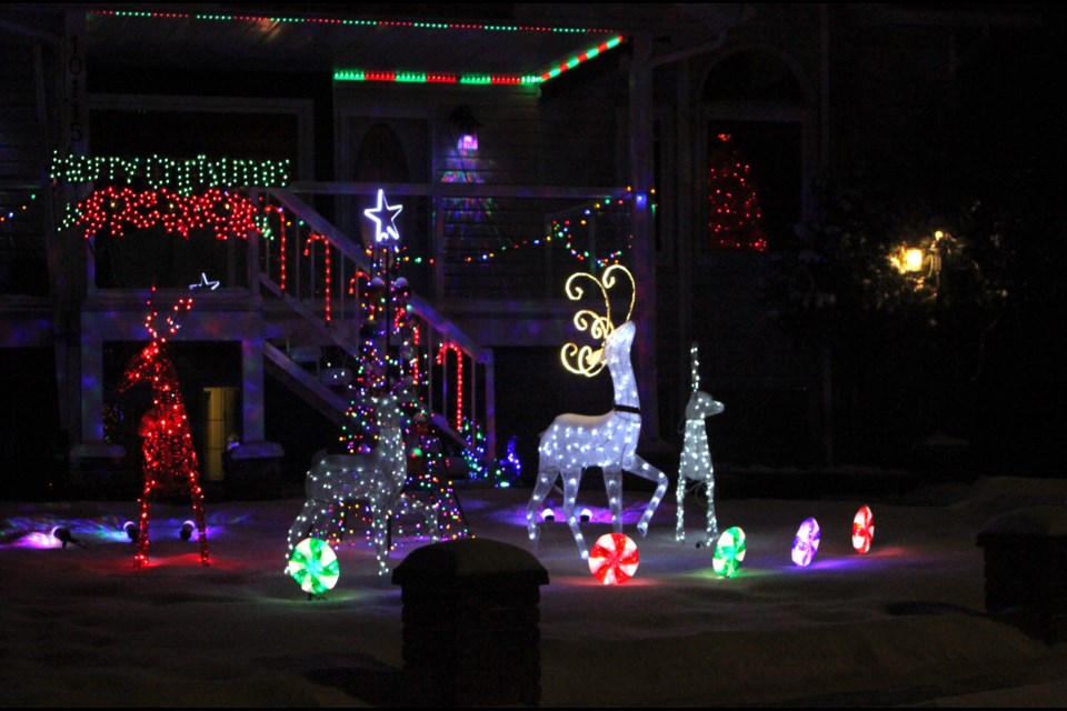 The best and the brightest. Elaborate, multicoloured displays of festive lights are a common sight around Lac La Biche during this holiday season. Chris McGarry photo. 