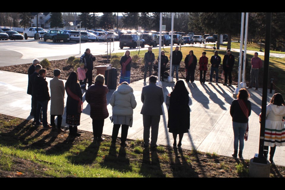 People gathered outside of the Portage College Lac La Biche campus to hear speeches prior to the raising of the Métis flag. Chris McGarry photo. 