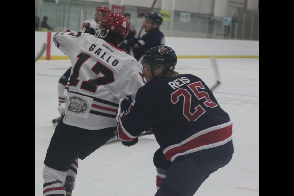 Portage College Voyageurs forward Matteus Reis comes up behind Nico Gallo of the Augustana Vikings during Friday's home exhibition match which the Voyageurs lost 3-0. Chris McGarry photo. 