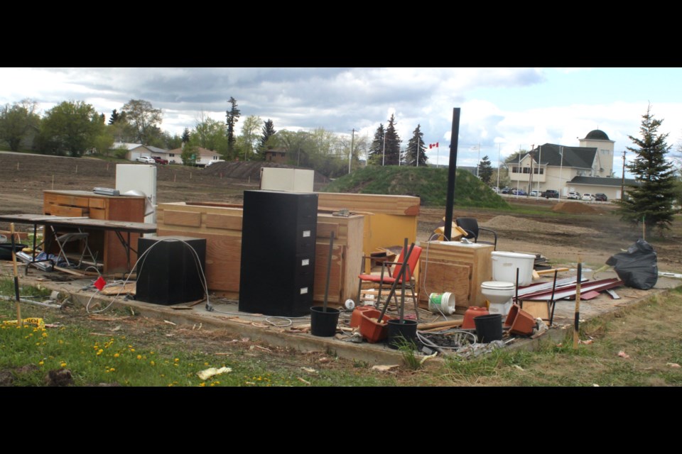 Chairs, desks, countertops, filing cabinets ... and even the office toilet from the former Pow Wow Hut were in plain view Friday afternoon. The Pow Wow Hut was dismantled by a private owner to make way for new features in Lac La Biche County's $7.3 million McArthur Park upgrade. Chris McGarry photo. 