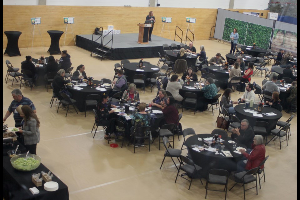 Participants in the 2024 Power Up North conference listen to some speeches during a lunch hour break in the Portage College gymnasium. Chris McGarry photo. 