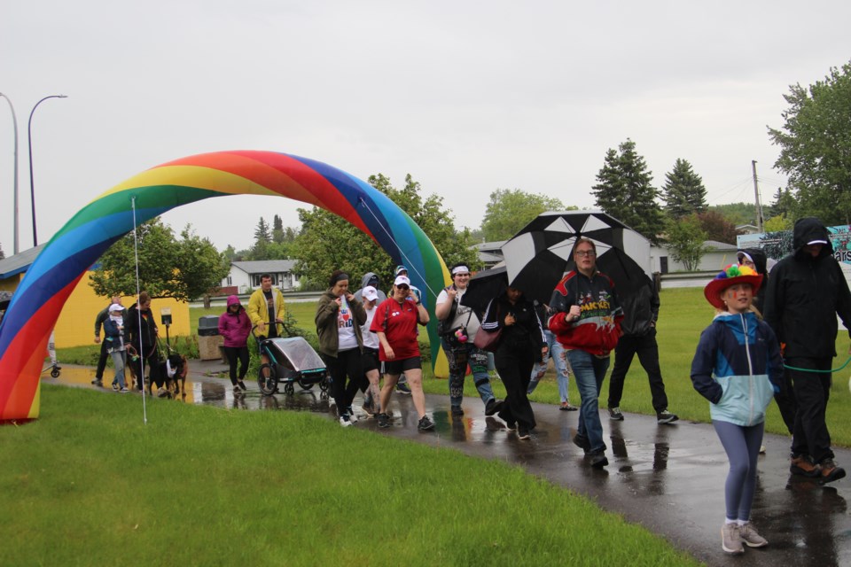 Cold Lake rainbow run participants braved the rain and began their walk to spread awareness and support of the LGBTQ+ community.