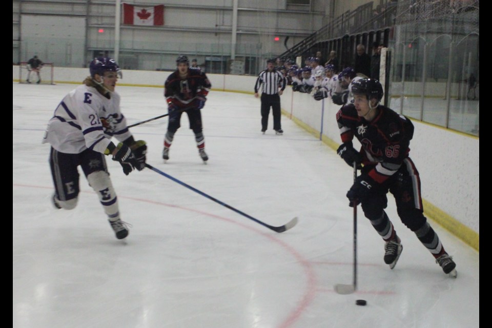 Lac La Biche Lakers forward Regan Anderson is intercepted by John Spraggs of the Edson Eagles as he moves toward Edson’s net during the final game of the semifinals between the two National Junior Hockey League (NJHL) squads, which took place at the Bold Centre on March 18. The Lakers won the game 3-2 to advance onto the finals against the Crowsnest Pass Crush. Chris McGarry photo. 