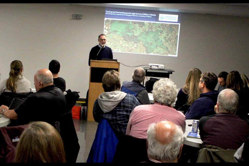 Rolf Vinebrooke, a professor in the Department of Biological Sciences at the University of Alberta, speaking at the open house for the Lac La Biche Watershed Management Plan on Nov. 28 at McArthur Place. Vinebrooke said algal blooms can be combated by reducing and eliminating phosphorus in lakes. Chris McGarry photo. 