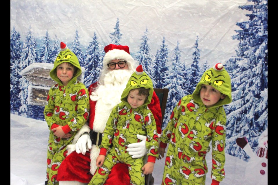 It isn’t every day that kids get to meet with Santa Claus and tell him in person what they would like for Christmas. But that is exactly what Kayden, Kylion, and Kaleb Gelinas did on the morning of Saturday, Nov. 23 during the 2024 Festival of Trees. Chris McGarry photo. 