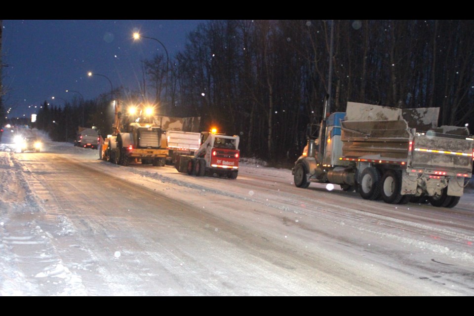 Snow removal crews and equipment working along 100 Street in Lac La Biche in mid-December. Chris McGarry photo. 