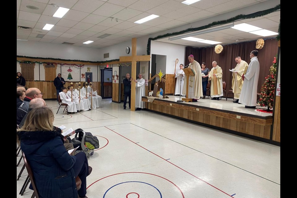 Catholics began the jubilee in the St. Paul Seniors' Centre before walking across the parking lot together on a pilgrimage to the St. Paul Cathedral Parish.