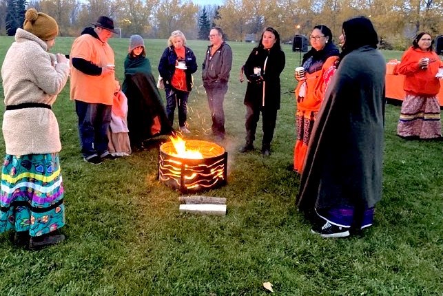 Participants gathered on the soccer field next to the Portage College Lac La Biche Campus for the 2023 sunrise ceremony. Chris McGarry photo. 