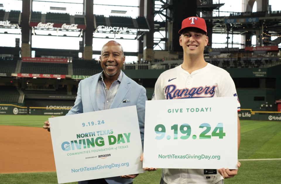 nathaniel-lowe-and-wayne-white-north-texas-giving-day-signs