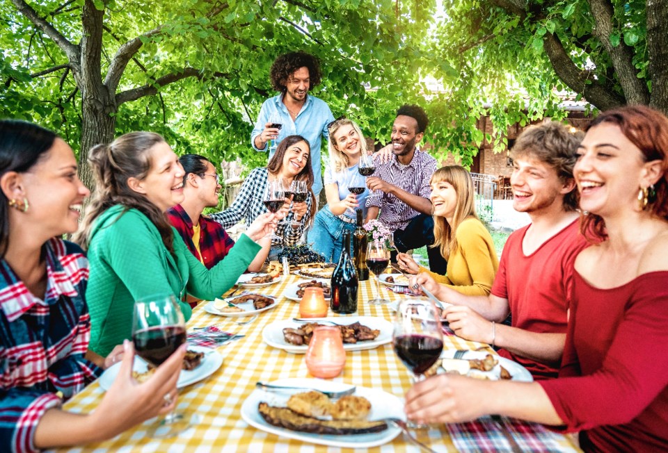 view-apart_happy-people-eating-outside_shutterstock_2274933655