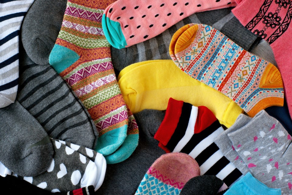 A,Pile,Of,Multi-colored,Socks.,View,From,Above.,Many,Colorful
