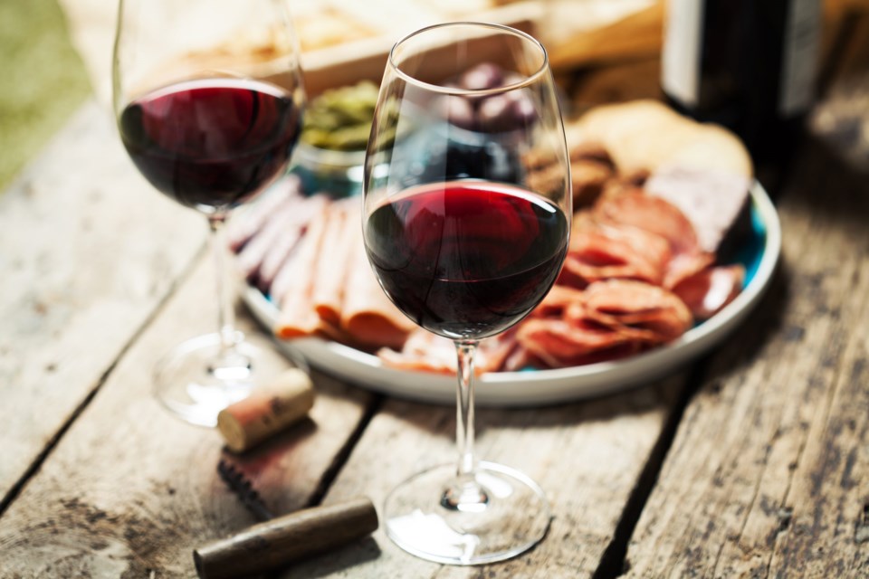 Red,Wine,With,Charcuterie,Assortment,On,The,Background