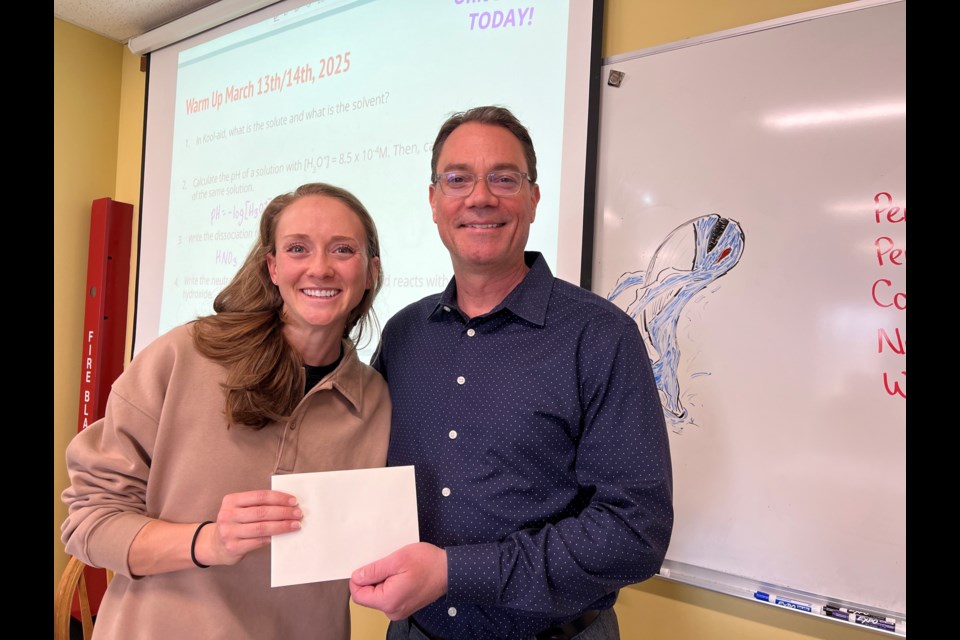 Longmont High School’s Teacher of the Year Kelly Lubkeman and LHS Principal Jeff McMurry