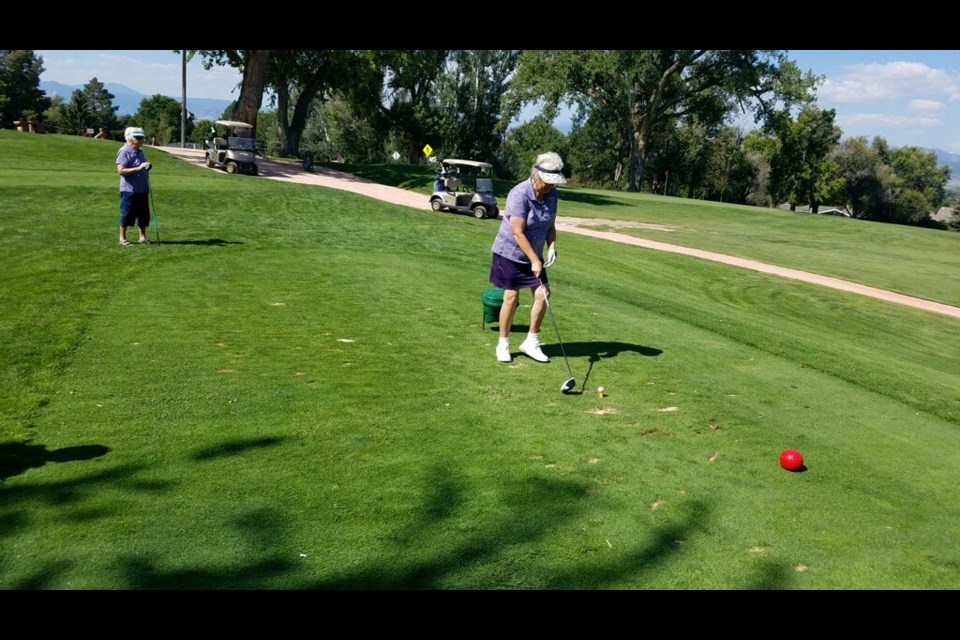 Jean Pazour tees up at Sunset Golf Course