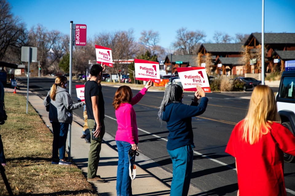 Nurses and community members gathered across from Longmont United Hospital in support of the nurses' unionization efforts.